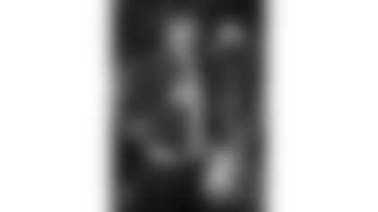 Kansas City Chiefs players and coaches arrive for a Week 13 matchup against the Dallas Cowboys.